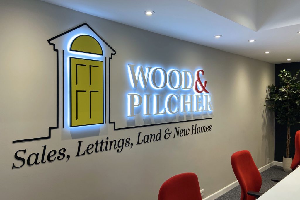 Halo illuminated wall logo.