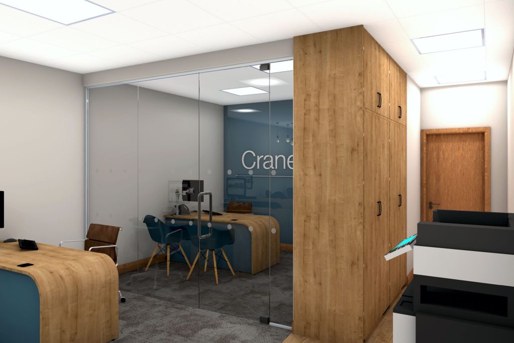 Glass partitioned office with storage wall.